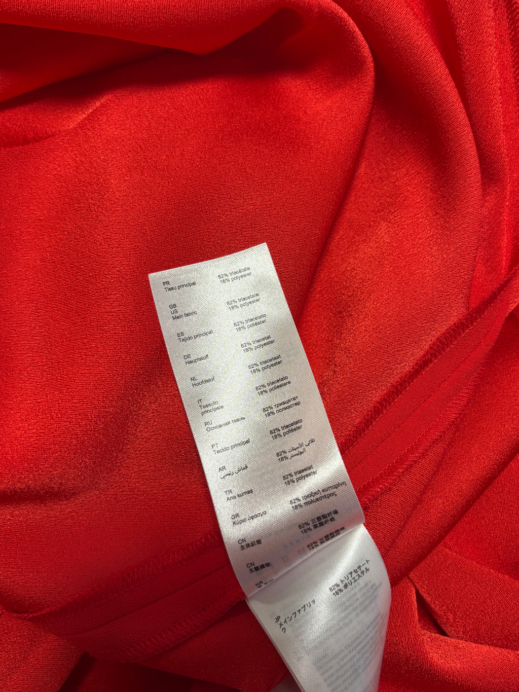 Robe boucle rouge, Claudie Pierlo