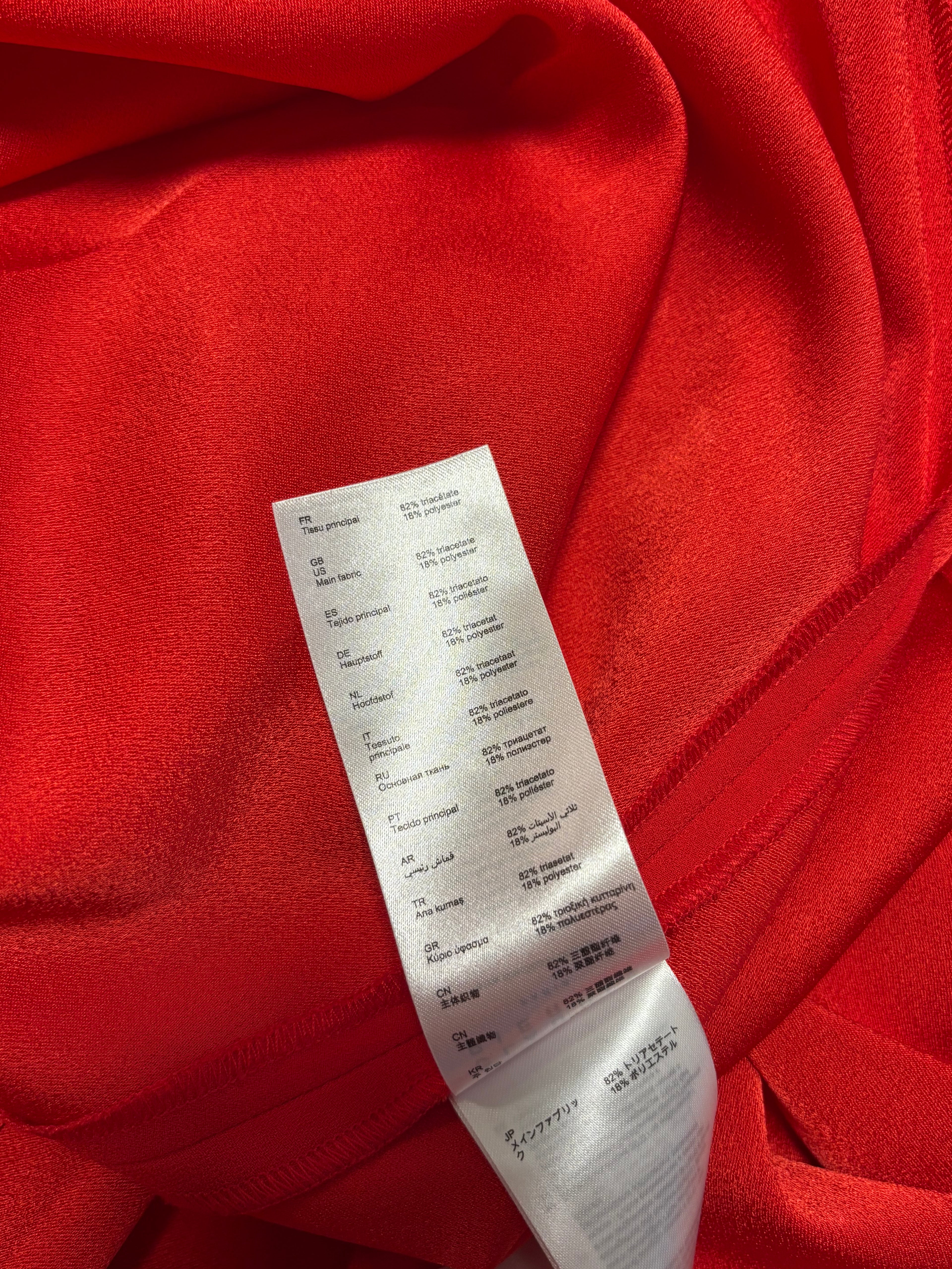 Robe boucle rouge, Claudie Pierlo